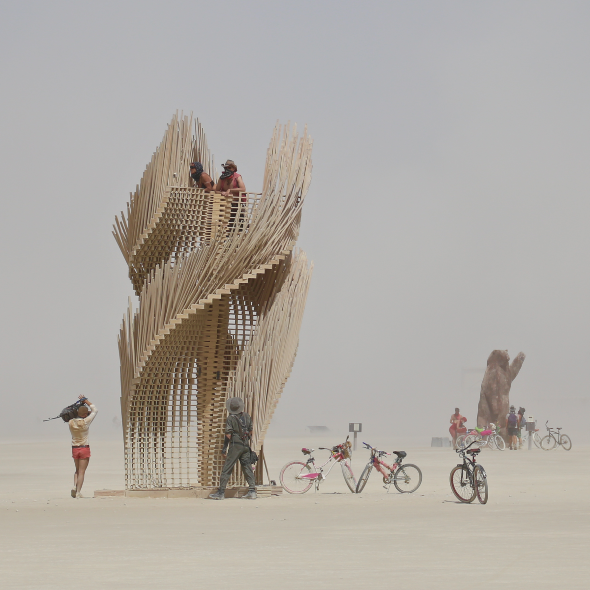Tangential Dreams at Burning Man 2016 - Day View witth Climber and Bear - Source: https://lostcoastoutpost.com ©Mamou-Mani