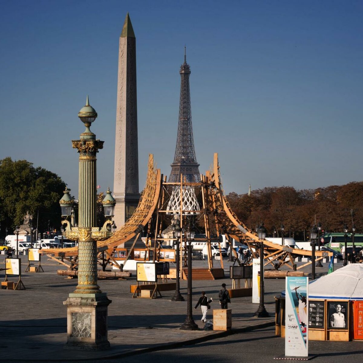 Concordia circular timber arena and auditorium on the Place de la Concorde in Paris, with the Eiffel Tower behind